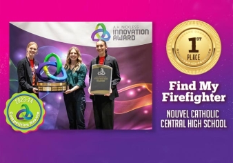 Team Leader Riley Mattheis and teammate Sydney Leslie, coached by teacher Clara Wagner, created a GPS tracking device that gives precise location of a firefighter