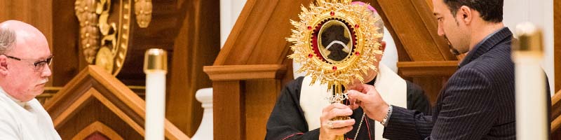 Fr. Bessert and Bishop Cistone Padre Pio Relic