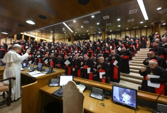 Pope Leo XIV prays with the College of Cardinals in the New Synod Hall at the Vatican May 10, 2025