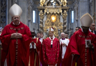 Pope Leo XIV greets the congregation during Pentecost Mass 