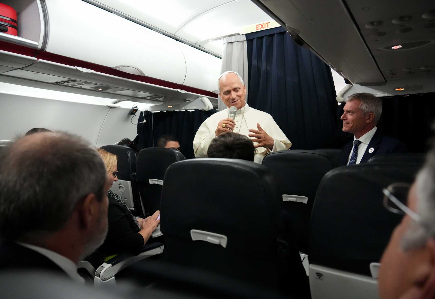 Pope Leo XIV speaks with journalists