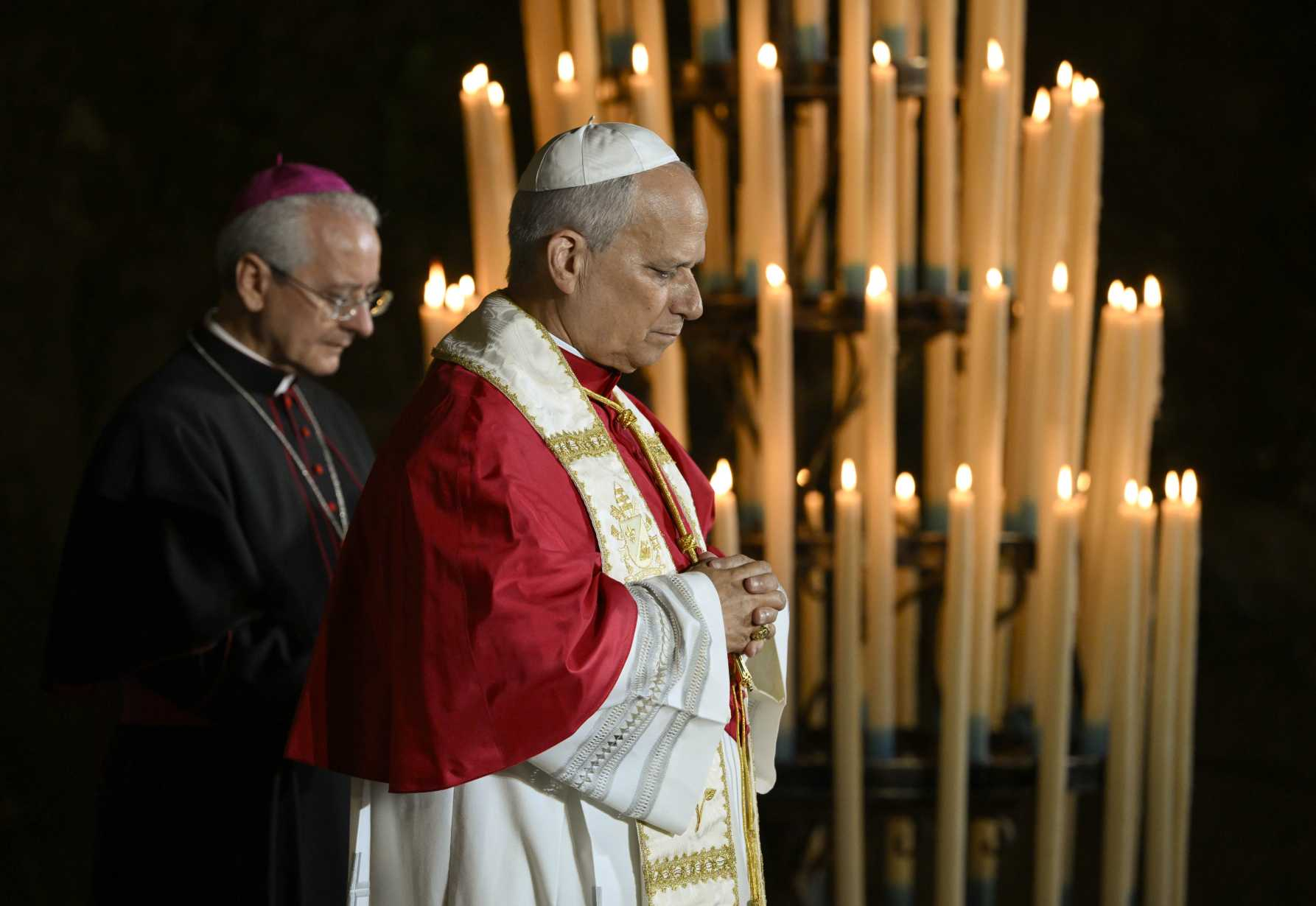 Pope Leo XIV prays at the Grotto of the Apparitions
