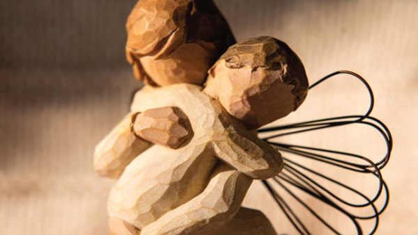 Angel Holding Baby Statue