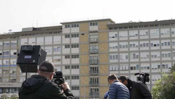 Members of the media are seen outside of Rome's Gemelli hospital 