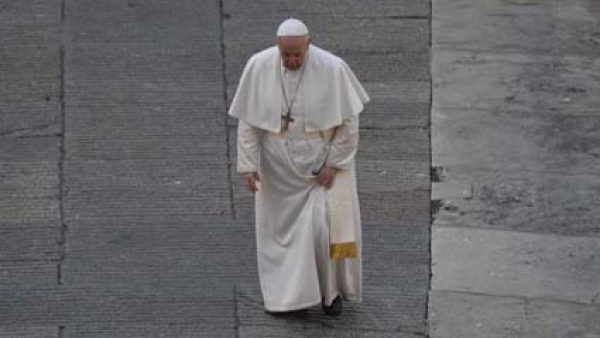 Pope Francis arrives for a prayer service in an empty St. Peter's Square 