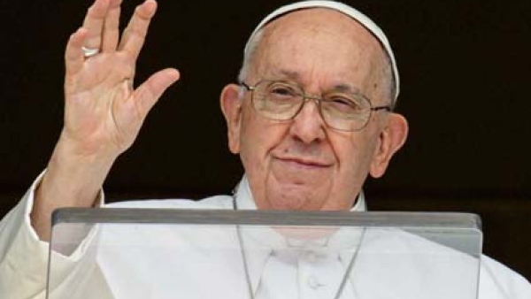Pope Francis greets visitors gathered in St. Peter's Square