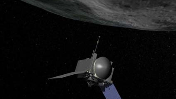 An artist's concept shows the Osiris-Rex spacecraft approaching the asteroid Bennu