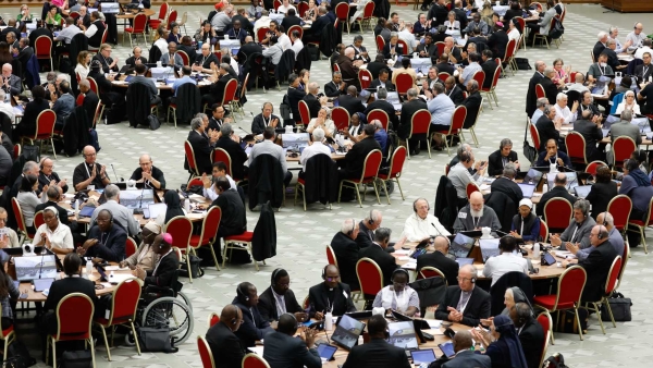 Members of the assembly of the Synod of Bishops start a working session