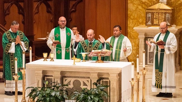 Fr. Adam, Andy, Jose and Stephen also Deacon Gary celebrating Mass