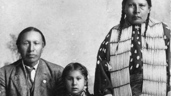 Nicholas Black Elk, daughter Lucy Black Elk and wife Anna Brings White, photographed ca 1910.