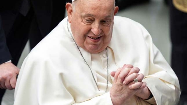 Pope Francis greets visitors at the conclusion of his general audience in the Paul VI Audience Hall at the Vatican Feb. 12, 2025