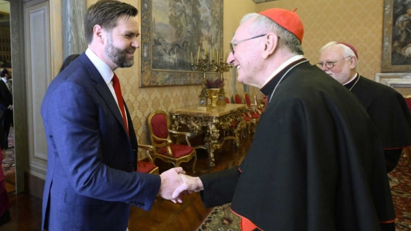 Cardinal Pietro Parolin, Vatican secretary of state, shakes hands with U.S. Vice President JD Vance during a meeting in the Apostolic Palace at the Vatican April 19, 2025. Archbishop Paul R. Gallagher, the Vatican foreign minister, looks on.