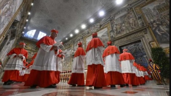 Cardinals process into the Sistine Chapel at the Vatican