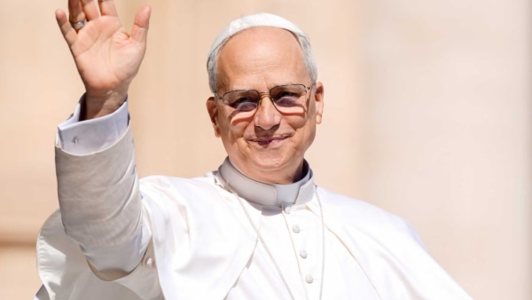 Pope Leo XIV greets visitors as he rides the popemobile around St. Peter’s Square 