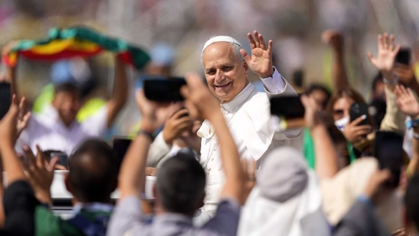 Pope Leo XIV waves to the crowd from the popemobile as he departs after celebrating a Mass concluding the Jubilee of Youth in Rome’s Tor Vergata