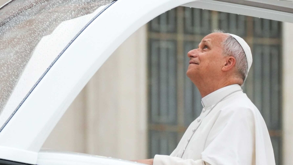 Pope Leo XIV looks upward as he arrives to begin his weekly general audience in St. Peter’s Square at the Vatican Sept. 10,