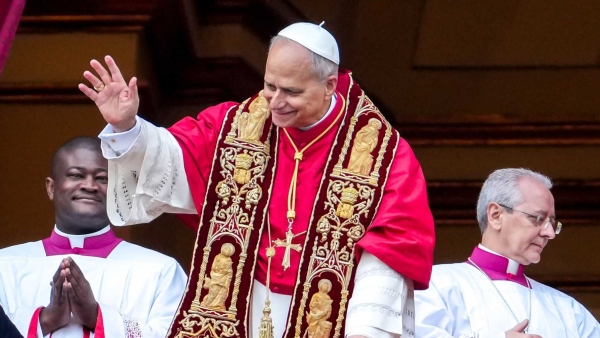 Pope Leo XIV waves to visitors gathered in St. Peter's Square 