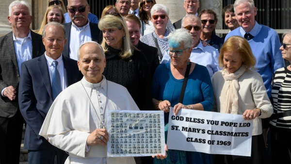 Pope Leo XIV poses with former classmates 