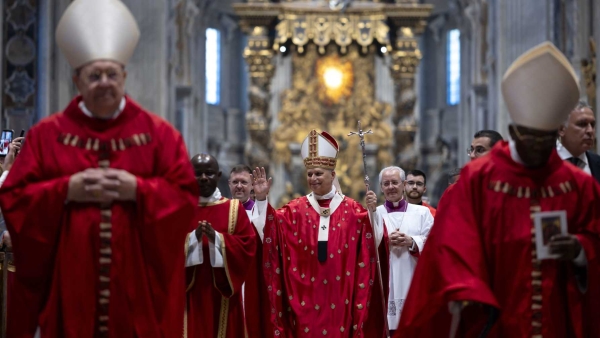 Pope Leo XIV greets the congregation during Pentecost Mass 