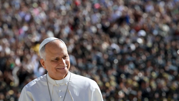 Pope Leo XIV smiles from the popemobile 