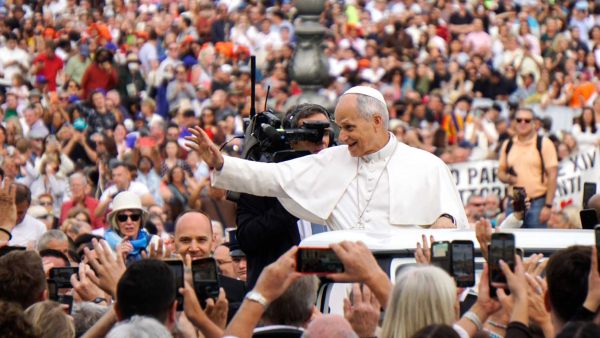 Pope Leo XIV greets visitors and pilgrims from the popemobile